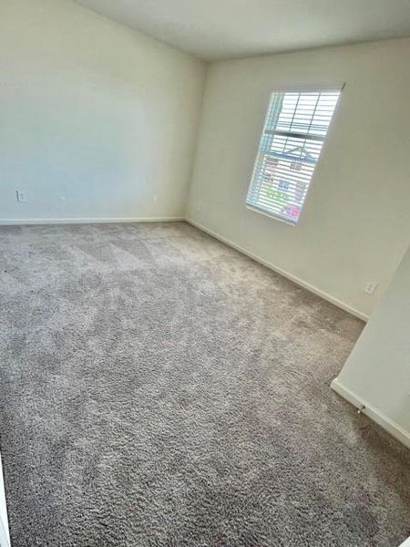 Empty room featuring carpet