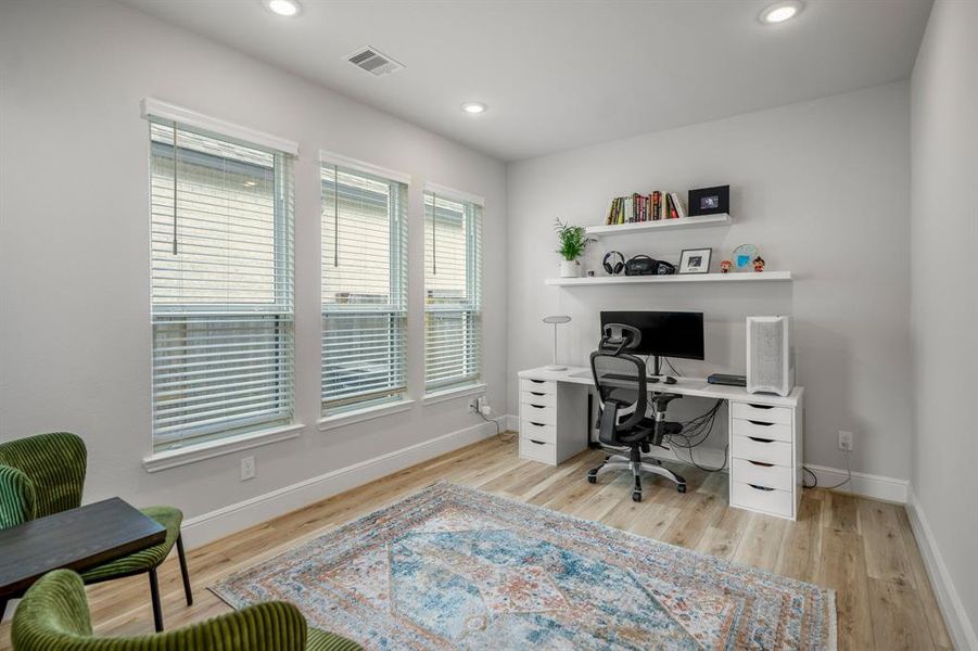 Just off the breakfast area is the perfect bonus space! Currently being used as a home office, it's the perfect space for a library, home gym, or wine bar!