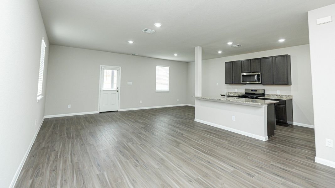 Family Room to Kitchen and Dining Area