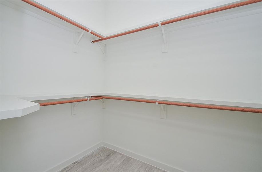 View of the walk-in master closet.