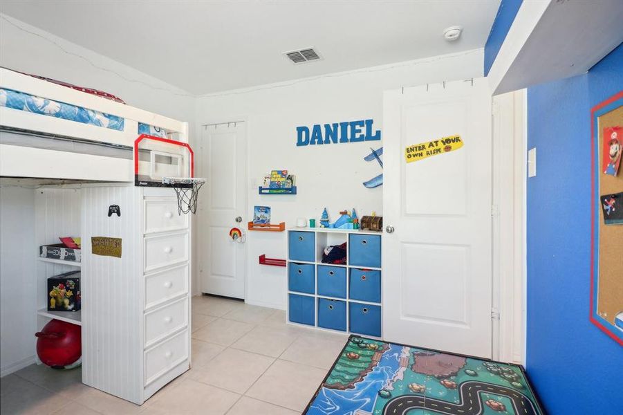 View of tiled bedroom