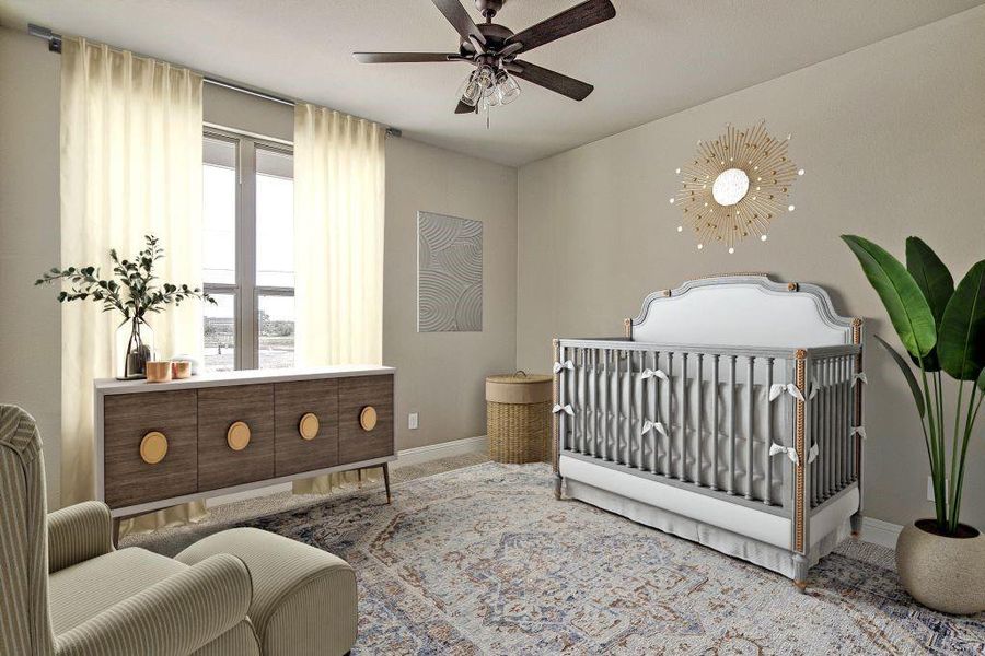 Bedroom with ceiling fan and a crib