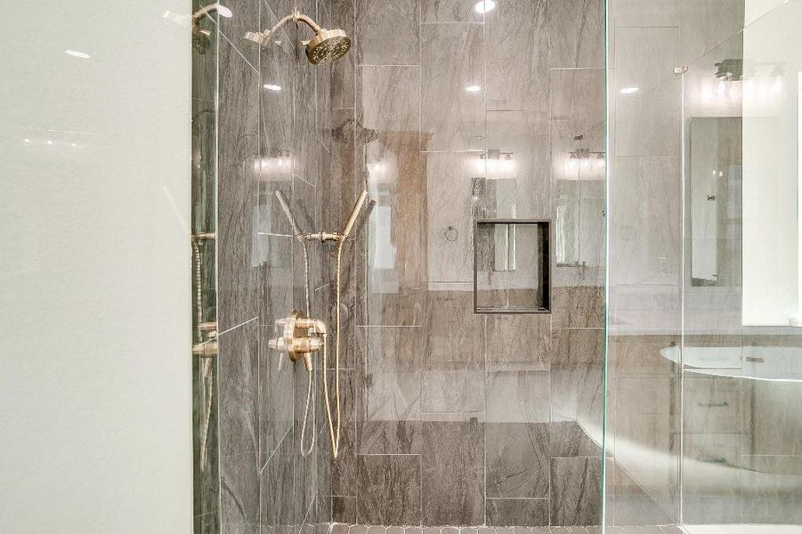 Bathroom featuring a shower with shower door