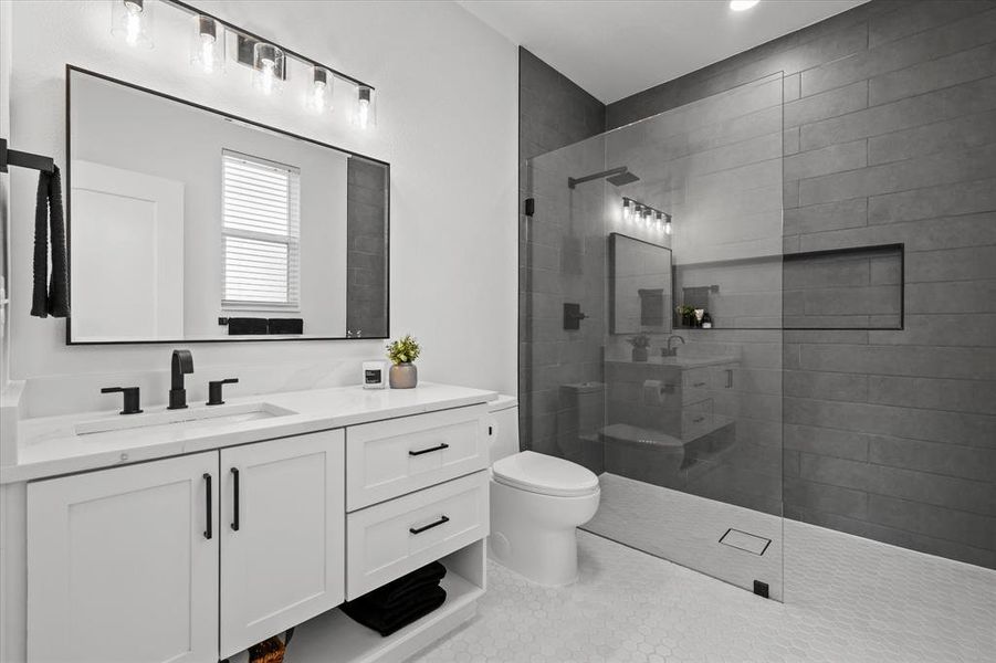 Primary Bathroom Featuring a Curbless Walk-In shower.