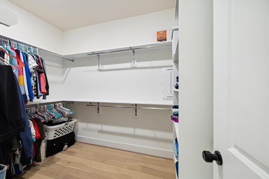 One of the two ample size closets in the primary suite.