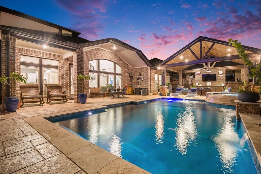 Approximately 1,326 sq. ft. of decked outdoor space surrounding the pool and under the patio