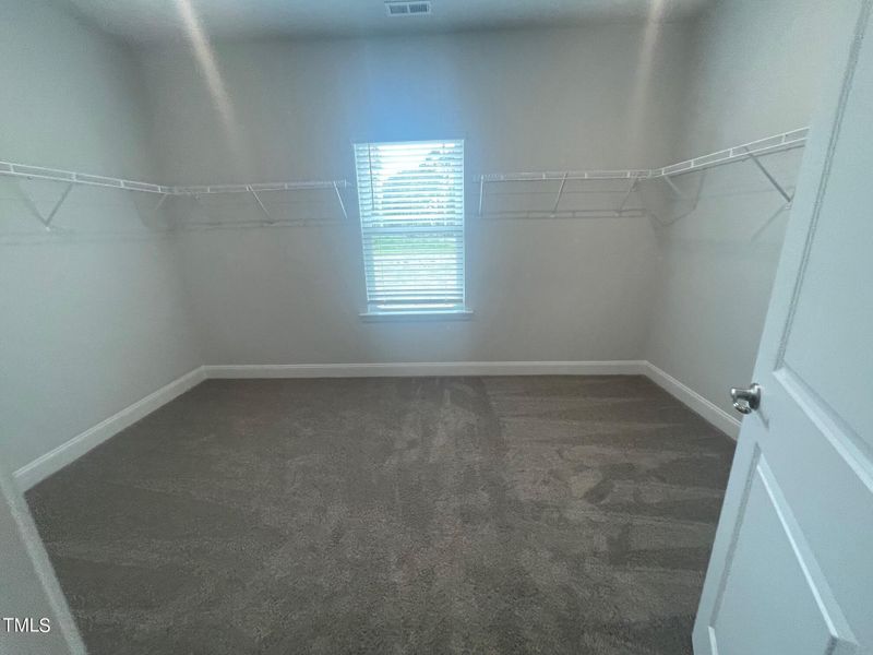 oversized primary walk in closet