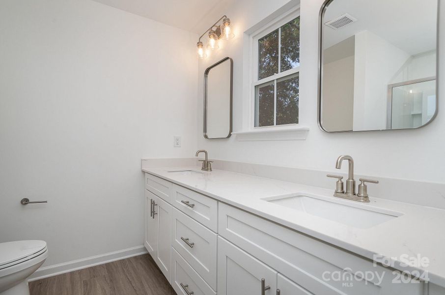 Representative Photo. Primary bathroom with double vanity