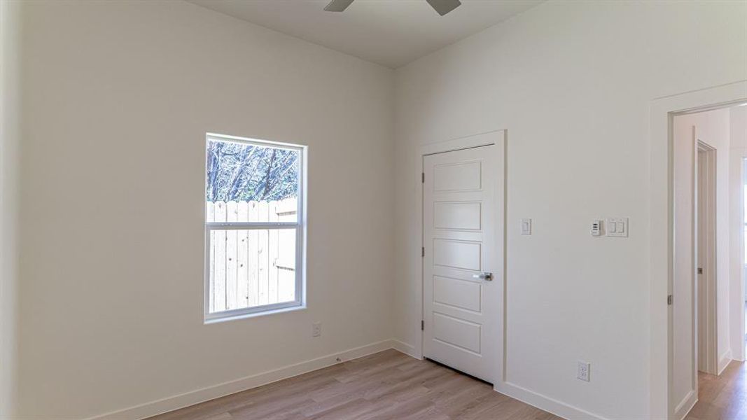 Secondary bedroom with walk in closet