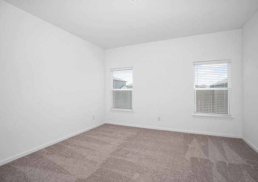 Master bedroom with double windows to allow a light and open space.