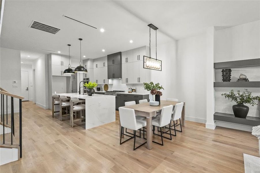 Dining room with light wood-type flooring