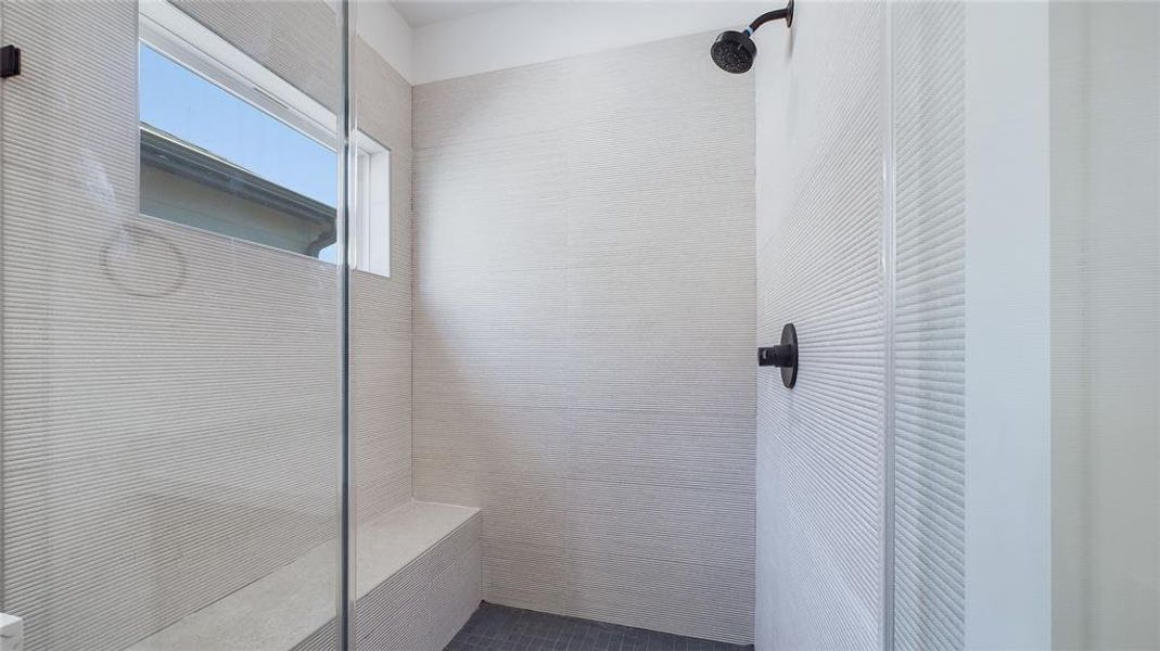 Alternate view of the your glass enclosed shower with a built-in bench