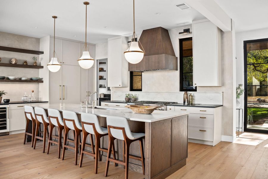 This magnificent kitchen is sure to delight the home chef with pro-style Thermador appliances and designer details and selections, complete with a butler's pantry.