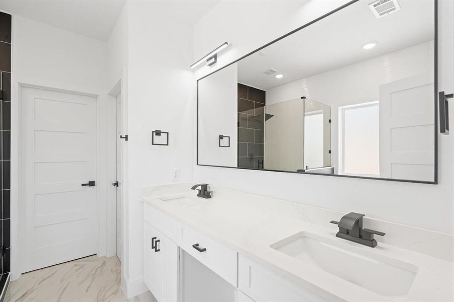 Master bathroom his and her sink