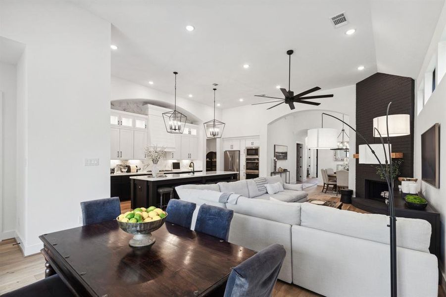 Truly open concept, the family room has clear sights to both the dining area and kitchen. Whether entertaining guests or keeping an eye on the littles, this layout delivers for modern needs and desires.