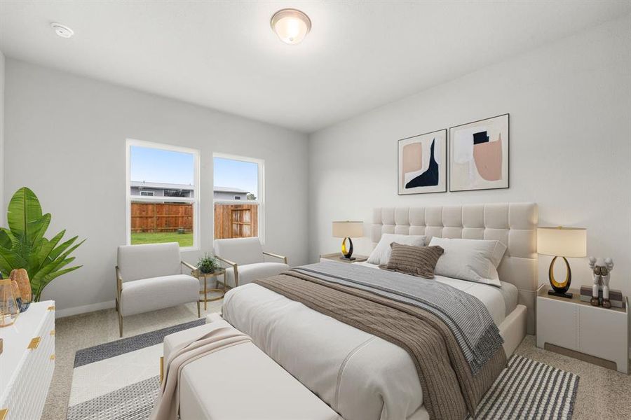 What a wonderful place to come home to, this stunning primary suite greets you with gorgeous carpet floors, a neutral paint, high ceilings, large windows allowing in natural light brightening up this spacious primary bedroom, with extra space for a seating area.