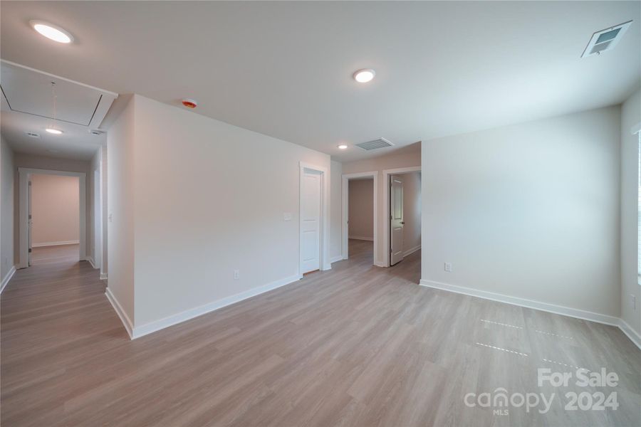 Loft features EVP flooring perfect for a bonus room or entertaining area