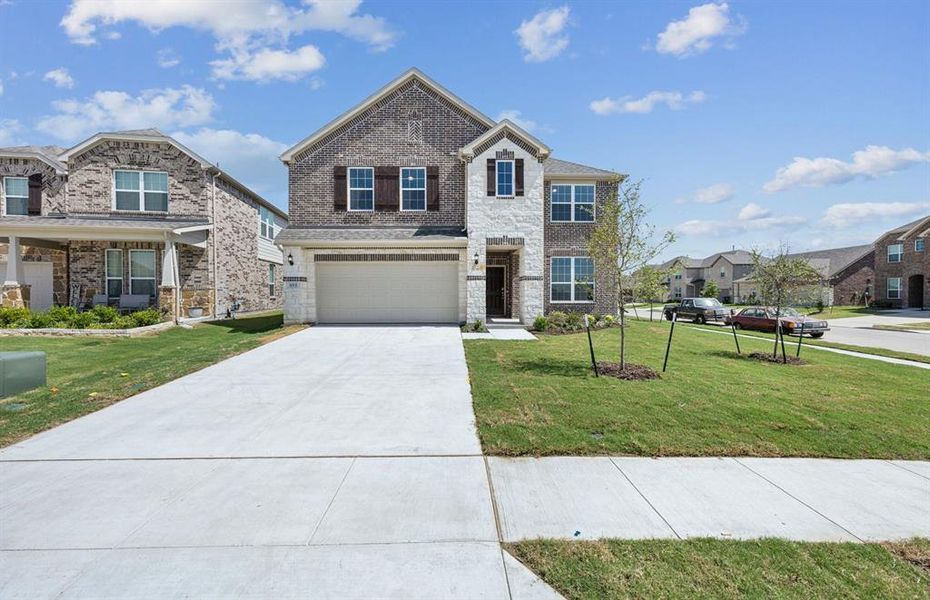 NEW CONSTRUCTION: Beautiful two-story home available at Anna Town Square.