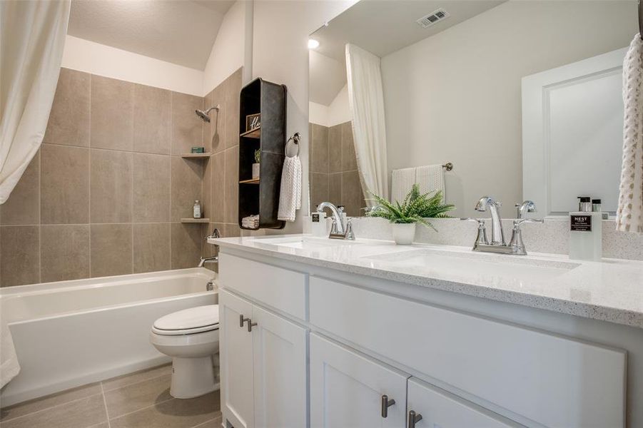 Family and friends will feel right at home in this beautiful guest bathroom!