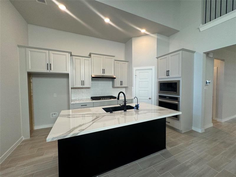 This kitchen is designed for the family that enjoy being all together.