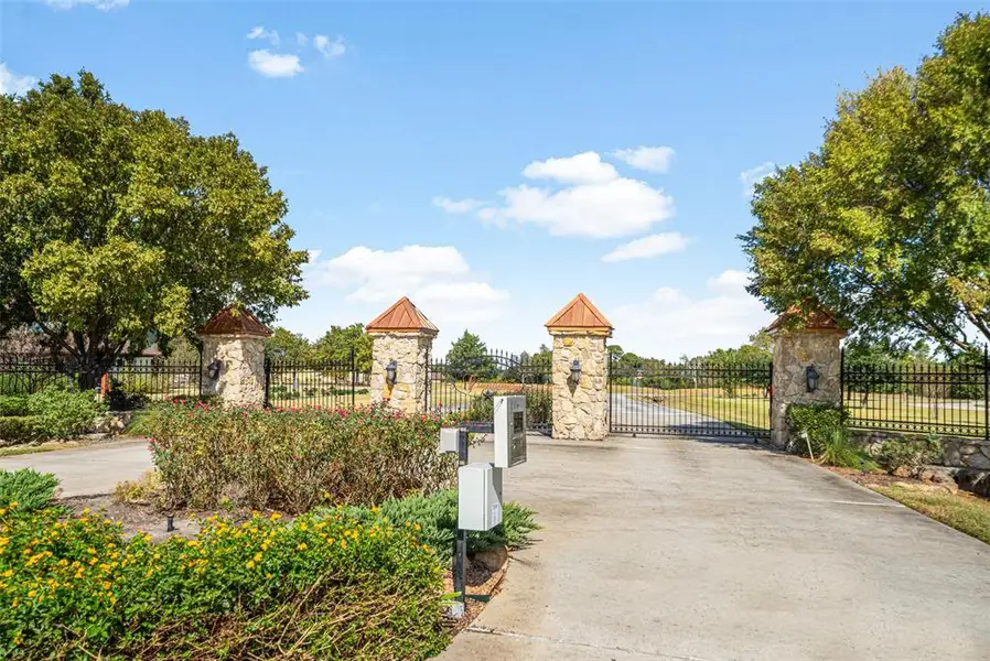 Gated main entry. Another private entry off of Bois D'Arc Bend