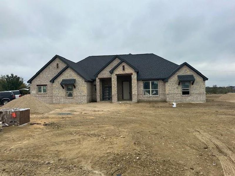 French provincial home with central AC unit