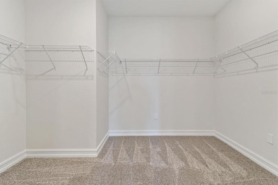 Huge Primary walk-in-closet