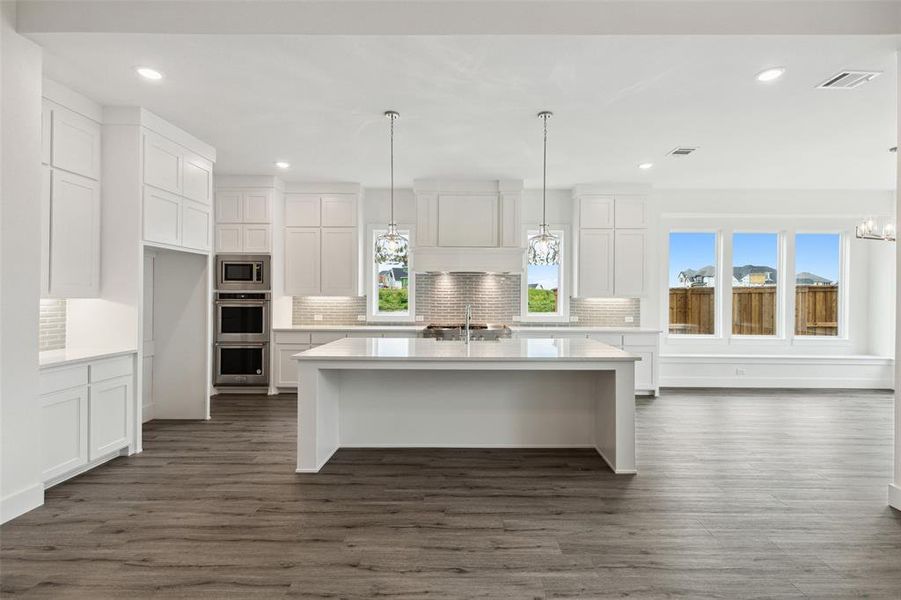Your spacious kitchen island is the perfect place for friends and family to gather!
