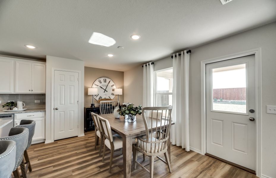 Dining area off kitchen with access to backyard