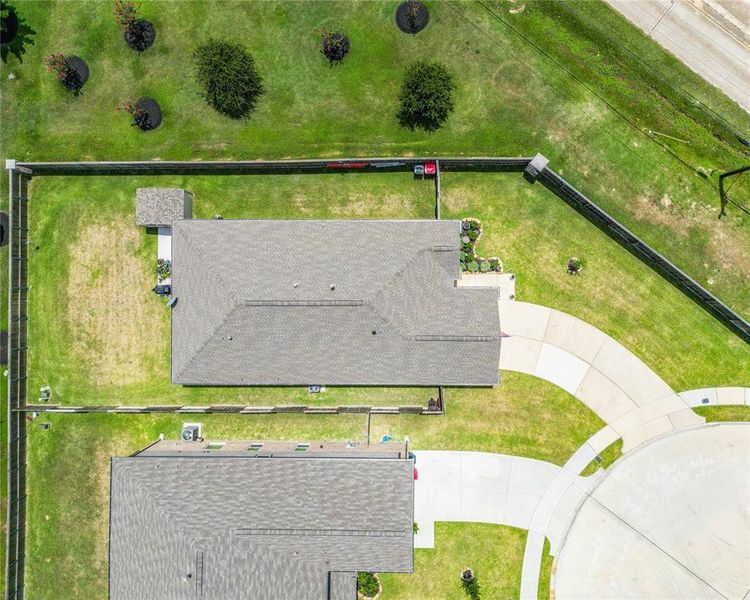 Aerial view. Notice the extended driveway.