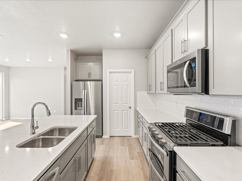 The Vail floorplan interior image taken at a Meritage Homes community in Northern Colorado.