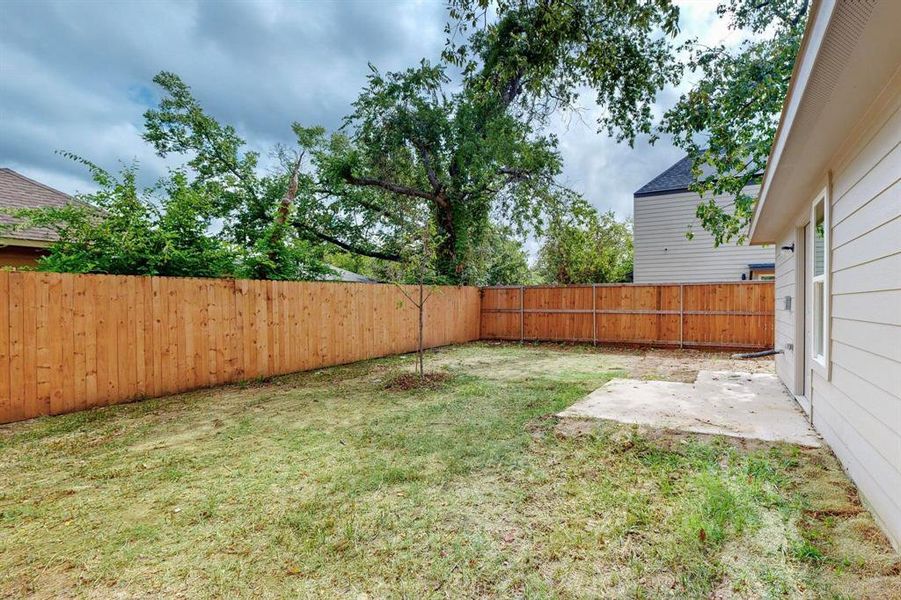 View of yard with a patio area