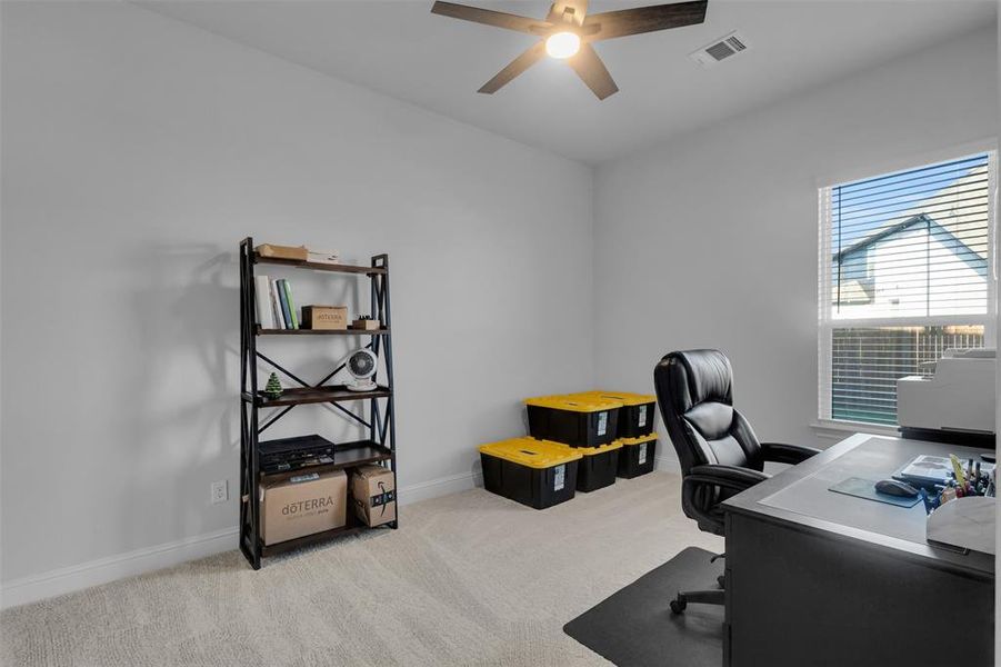 Bedroom 2/Office area featuring ceiling fan and light carpet