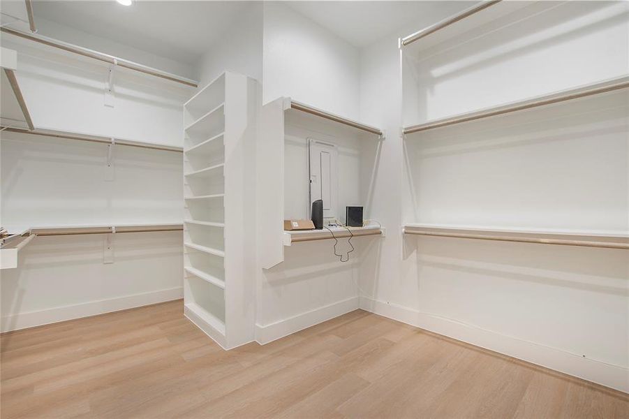 Walk in closet featuring hardwood / wood-style flooring