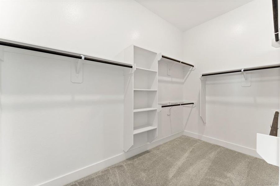 Walk-in Closet at Primary Bedroom