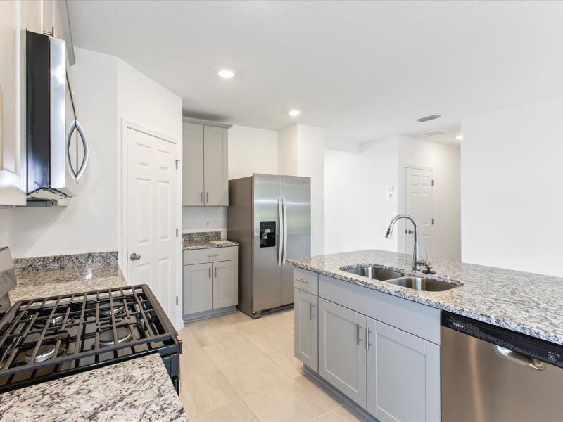 Kitchen in the Daphne floorplan at 5170 Minneola Lane