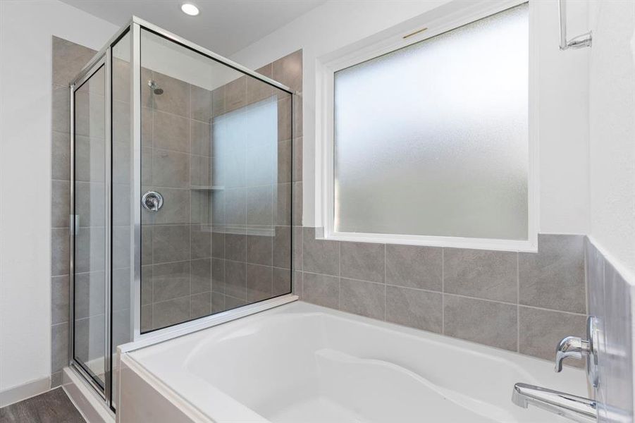 This bathroom was made for two! **Representative Photo of Plan only and may vary as built**