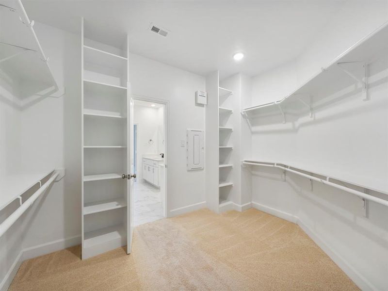 Large Walk-In Closet with built-in shelving for added storage! (Sample photos of a completed Gibraltar floor plan. The image may feature alternative selections and/or upgrades.)