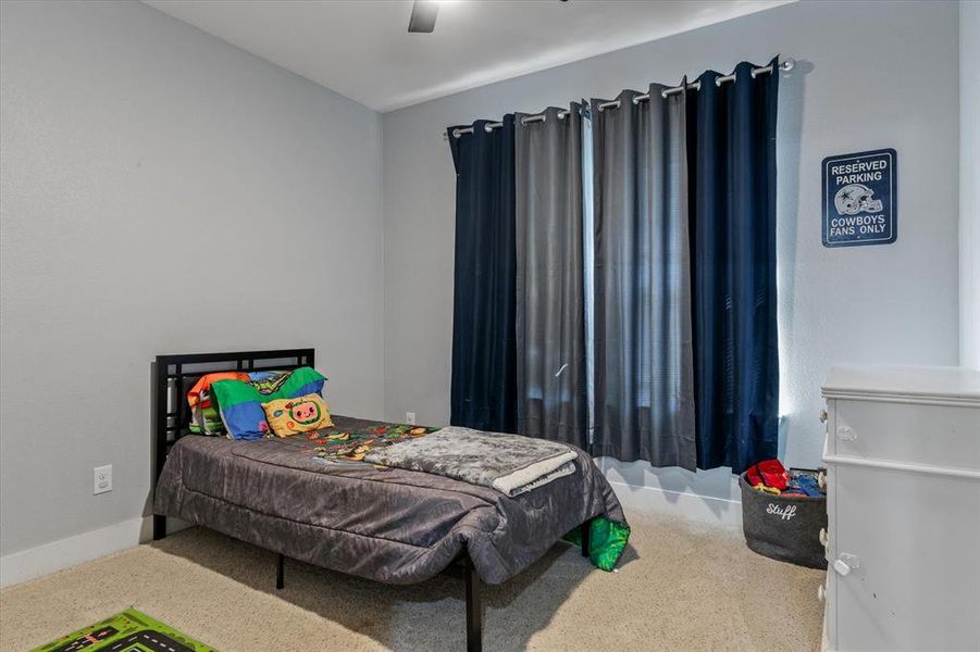 Bedroom featuring ceiling fan