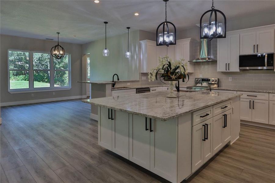 VIEW OF KITCHEN AND KITCHEN NOOK