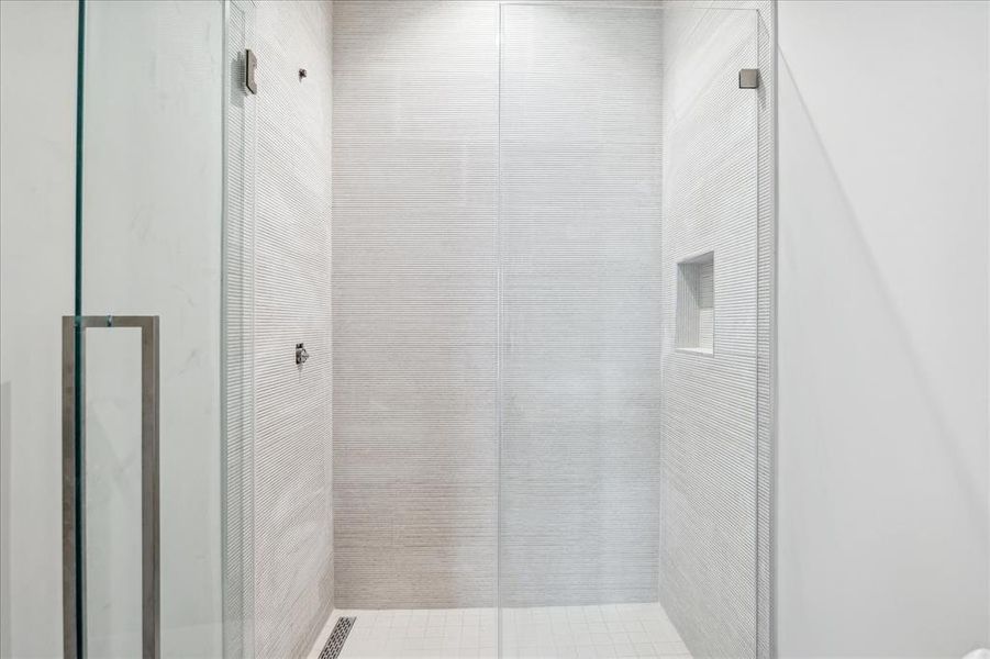 Secondary bathroom with timeless neutrals throughout