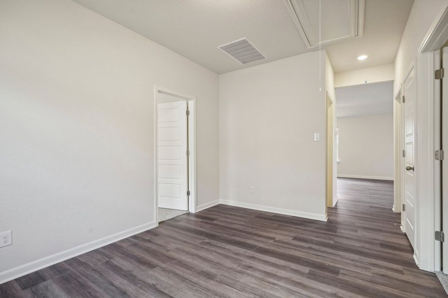 Guest bedroom in the Allen floorplan at a Meritage Homes community.