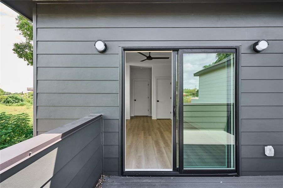 large patio adjacent to primary bedroom