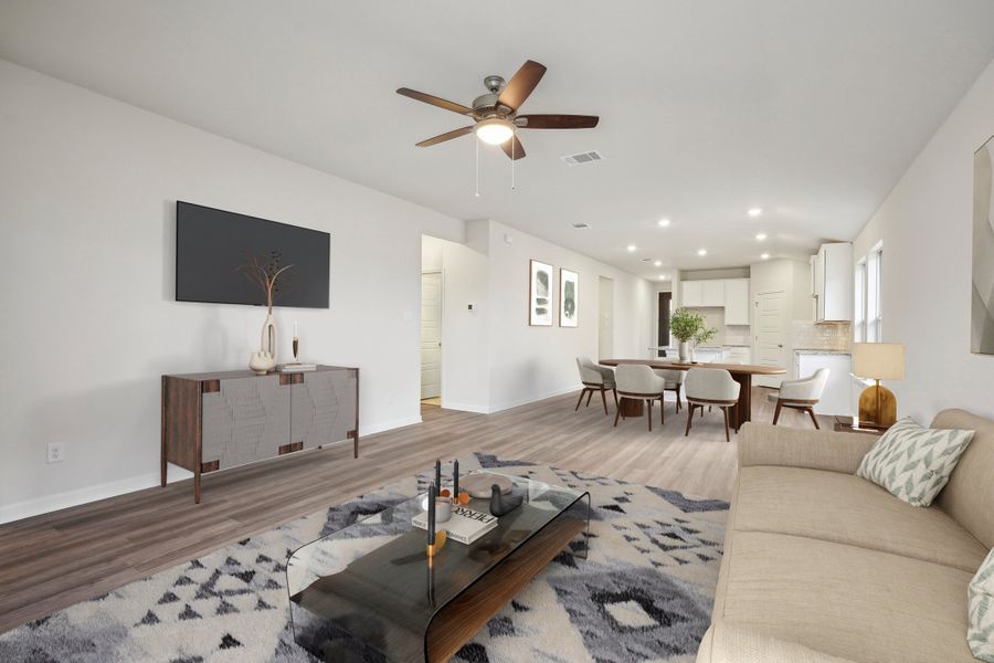 Virtually staged living room in the Allen floorplan at a Meritage Homes community.