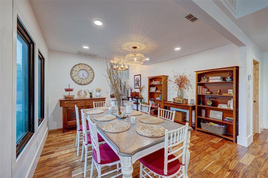 Open & inviting floorplan offers generous dining space that flows from the ktichen across the entryway and into huge living room. 94 San Saba St., AustinTX 78702 MLS# 7207900