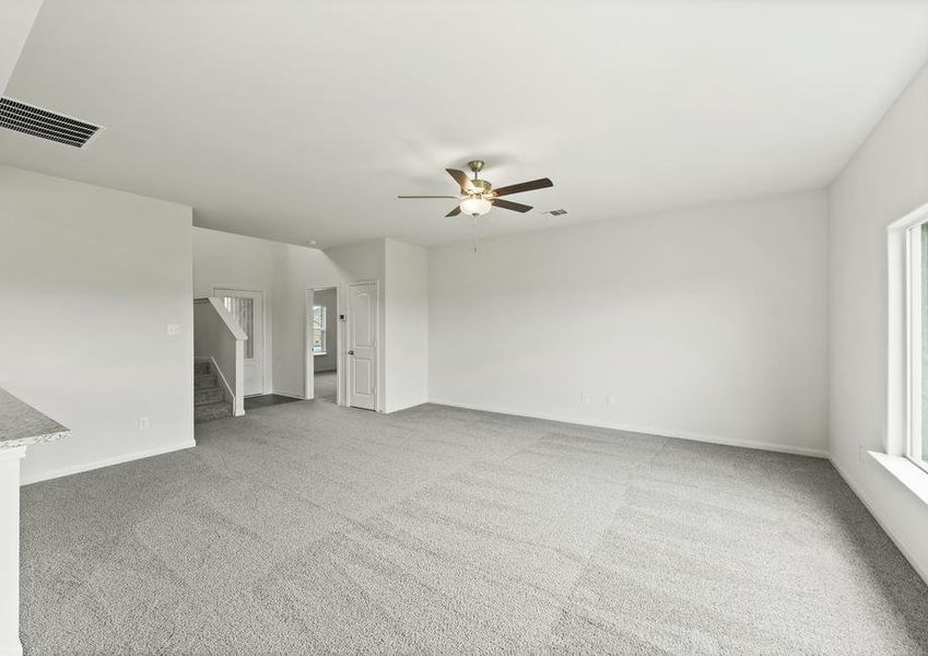 The spacious family room is perfect for everyday family living and hosting.