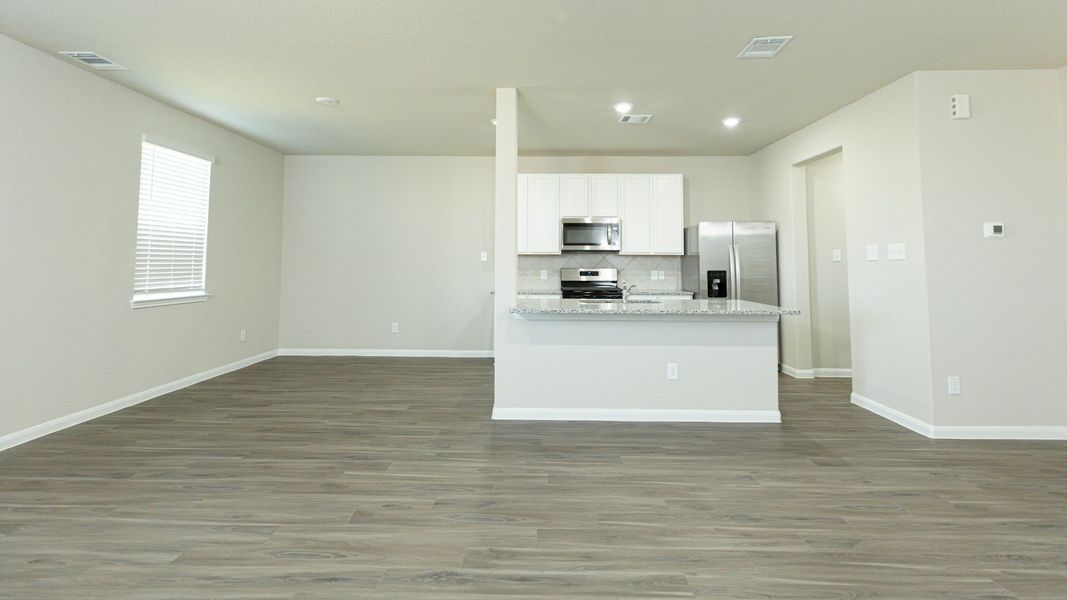 Family Room to Kitchen and Dining Area