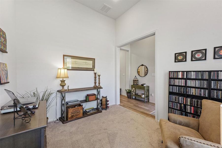 The entry foyer accesses the flex space/office with glass French doors (French doors currently removed but easily added back on request of buyers)