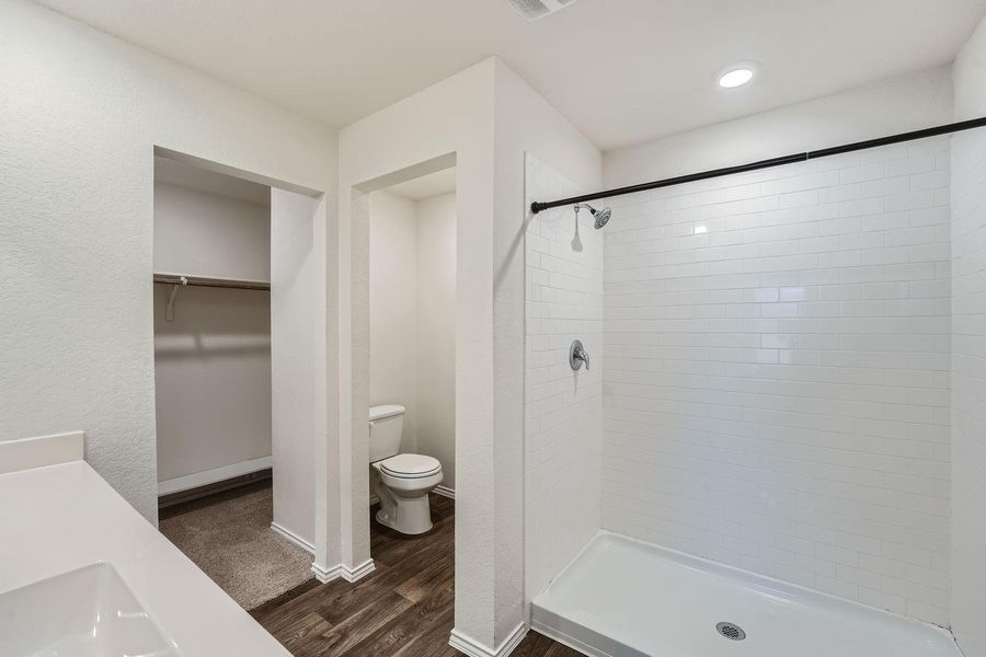 Primary bathroom & large walk-in closet