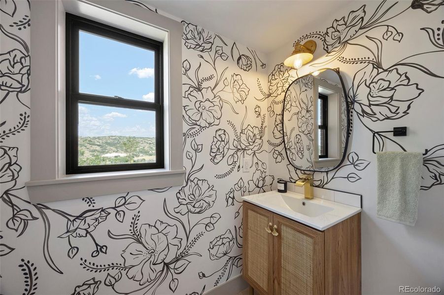 Front powder room with hand painted mural